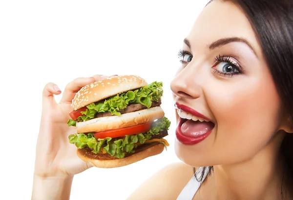 Menina engraçada comer hambúrguer — Fotografia de Stock