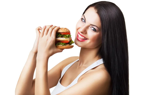 Девушка ест гамбургер — стоковое фото