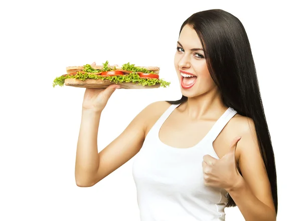 Женщина с бутербродом — стоковое фото