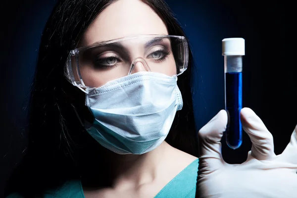 Scientist holding tube — Stock Photo, Image