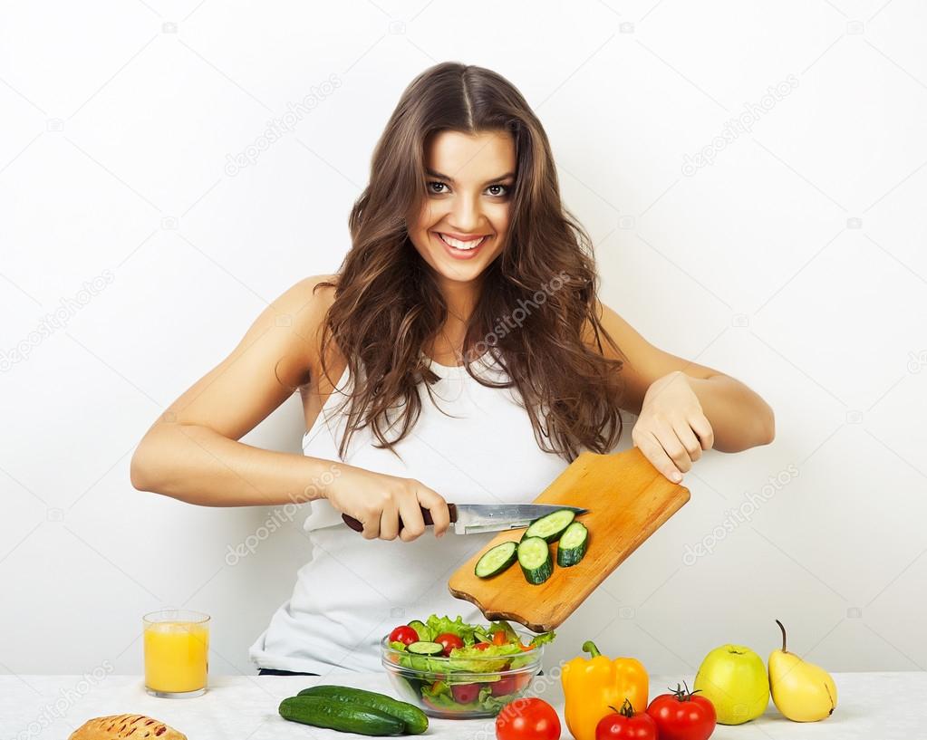 Woman cooking vegetables