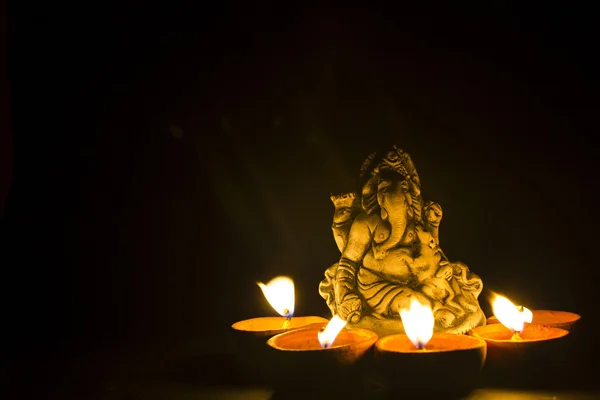 Lord ganesh in lamp light — Stock Photo, Image