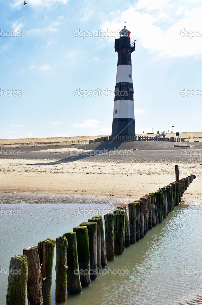 Lighthouse on a beach in Holland