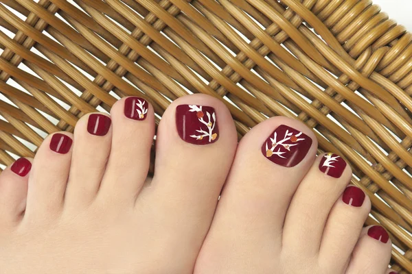 Burgundy pedicure. — Stock Photo, Image