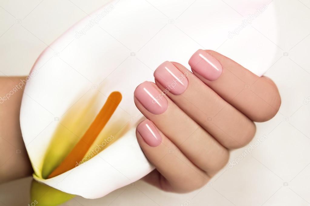 Manicure with gel coating .