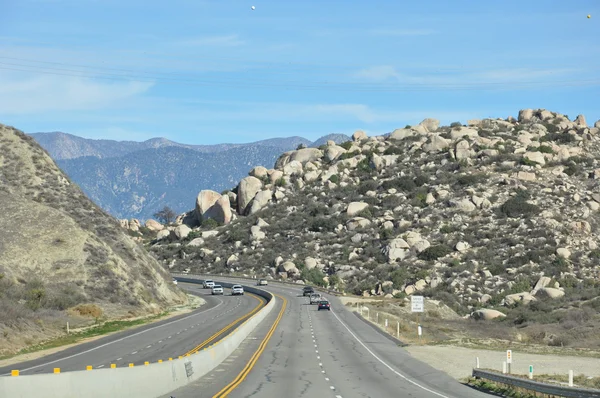 Dennen aan palmen scenic byway — Stockfoto