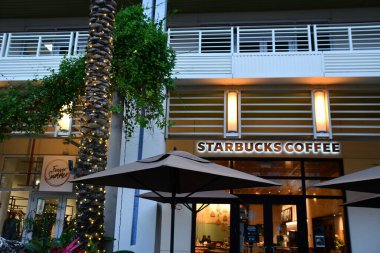 GRAND CAYMAN, CAYMAN ISLANDS - FEB 20: Forever Summer & Starbucks Coffee at Camana Bay in Grand Cayman on the Cayman Islands, as seen on Feb 20, 2022.