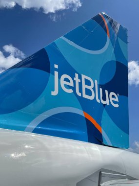 GRAND CAYMAN, CAYMAN ISLANDS - FEB 20: JetBlue airplane at the Owen Roberts International Airport on Grand Cayman in the Cayman Islands, as seen on Feb 20, 2022.