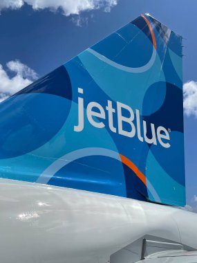 GRAND CAYMAN, CAYMAN ISLANDS - FEB 20: JetBlue airplane at the Owen Roberts International Airport on Grand Cayman in the Cayman Islands, as seen on Feb 20, 2022.