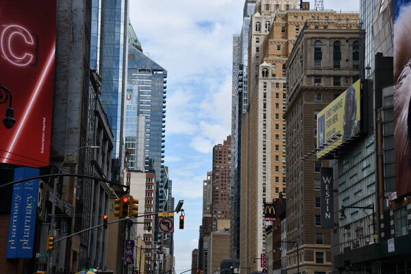 NEW YORK, NY - SEP 18: Times Square, featured with Broadway Theaters and animated LED signs, in Manhattan, as seen on Sep 18, 2021. It is a symbol of New York City and the United States.