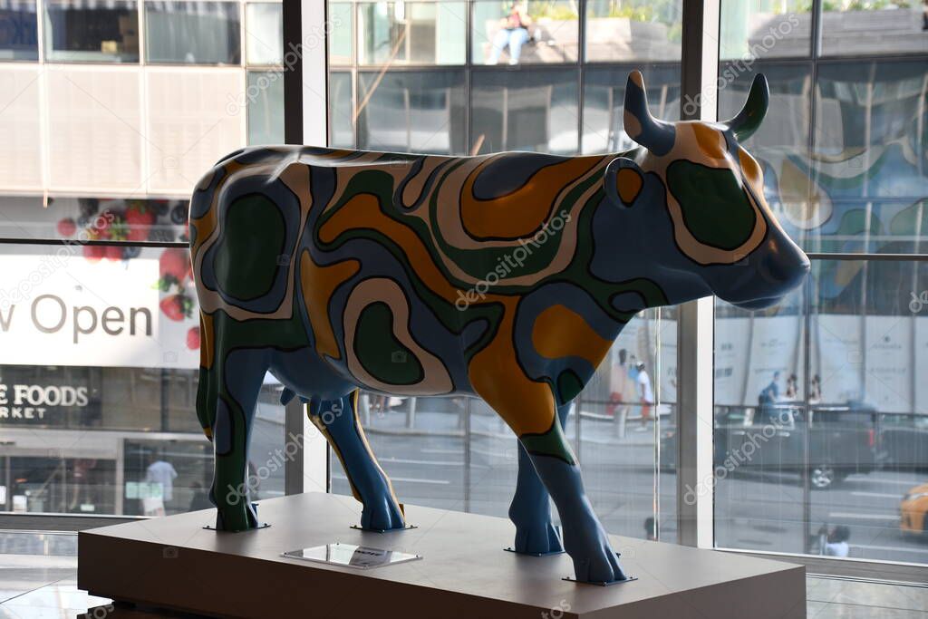 NEW YORK, NY MAY 26 CowParade Sculptures at The Shops and