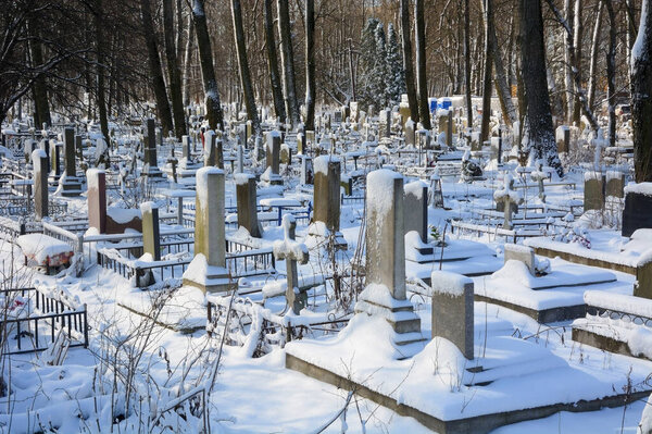 Traditional cemetery in St. Petersburg, Russia, Volkovskoye cemetery. Winter.