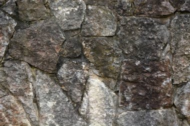 Farklı taşlardan ve betondan yapılmış doku. Resim arkaplan olarak kullanılabilir