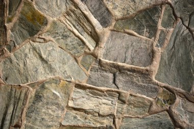 Farklı taşlardan ve betondan yapılmış doku. Resim arkaplan olarak kullanılabilir