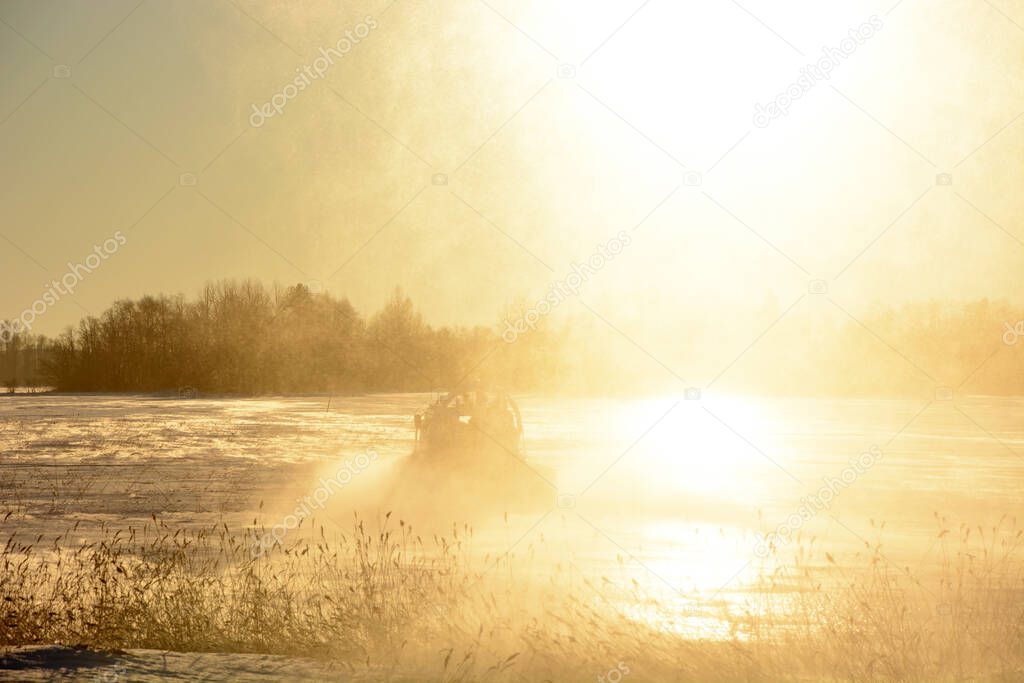 Hivus-10 on the frozen Onego lake, Karelia Republic, Russia, sunset