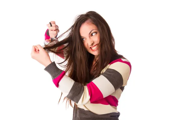 Woman hold damaged hair and cut them with scissors — Stock Photo, Image