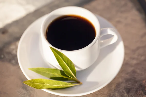 Svart kaffe och cup — Stockfoto