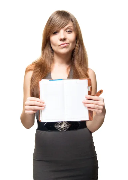 Beautiful young woman with open on a blank page datebook with un — Stock Photo, Image