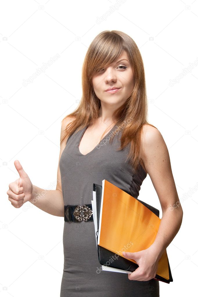 A young woman, holding documents and shows a thumbs up gesture
