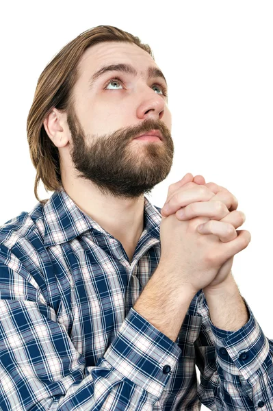 Młody człowiek z brodą modli się do Boga — Zdjęcie stockowe