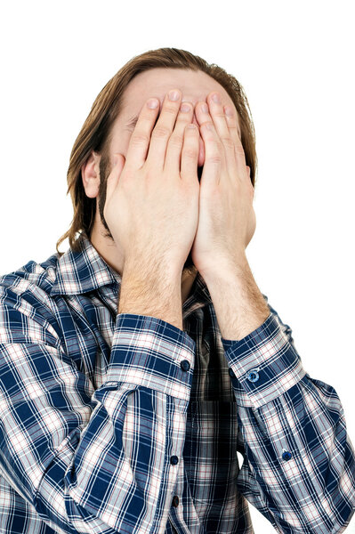 Man's face closed by hands