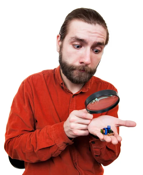 Man Peering through Magnifying Glass — Stock Photo, Image