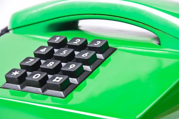 Grünes Telefon isoliert auf weiß — Stockfoto