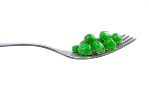 Peas on a fork — Stock Photo, Image