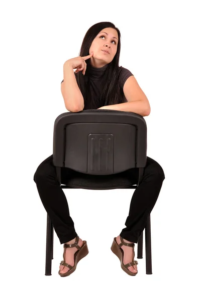 Woman sitting on a chair — Stock Photo, Image