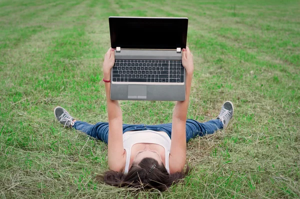 Girl with a computer — Stock Photo, Image