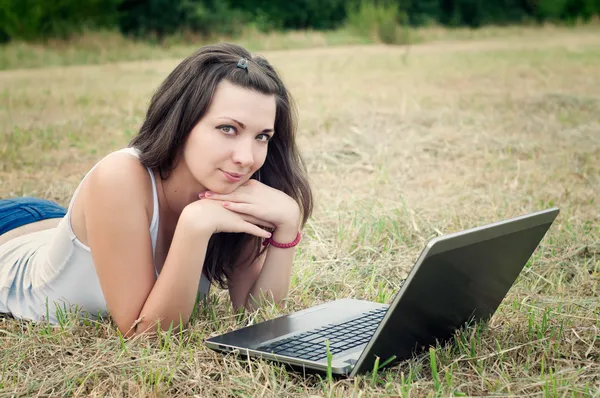 Girl with a laptop — Stock Photo, Image