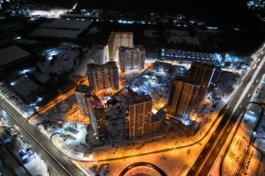 Modern residential buildings in the city at night. Aerial photography. Urban landscape. Kyiv, Ukraine.