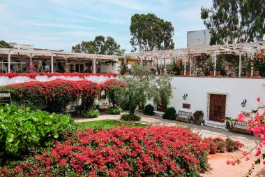 Lima, Peru - January 2, 2022:  Courtyard at the Larco Museum. One of the most interesting and famous museums in the city.