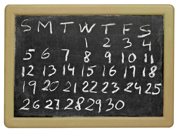 Calendar planner on a blackboard — Stock Photo, Image