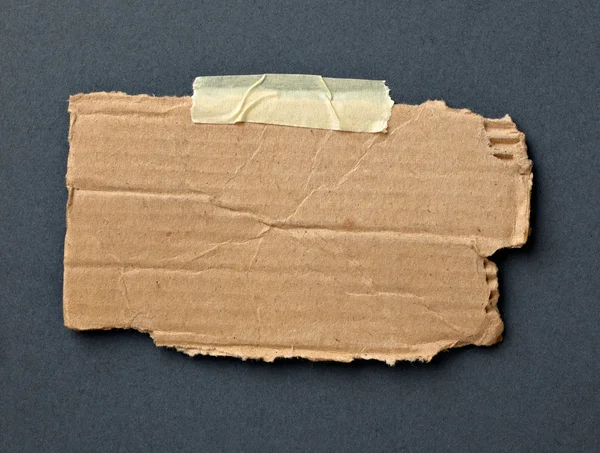 Dopisní papír s karton kus lepicí pásky — Stock fotografie