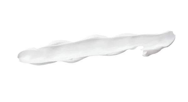 Косметика с мазком белого крема — стоковое фото