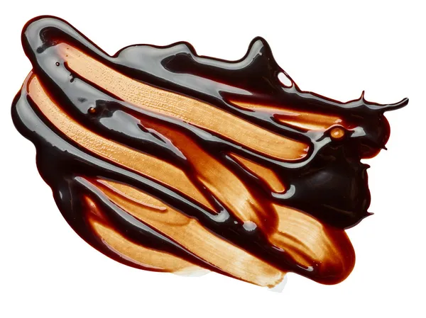 Çikolata lekeli flek yiyecekler tatlı şurubu sıvı damlalar dökülen pislik eriyip gidiyor — Stok fotoğraf