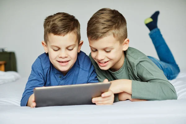 Child brother friend having fun tablet laptop happy kid — Stock Photo, Image