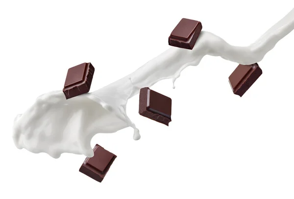 Trozo de chocolate chorro de leche flujo —  Fotos de Stock
