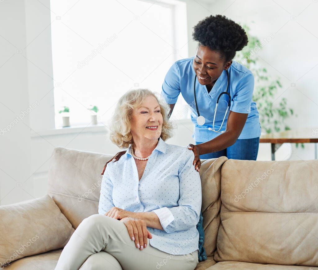 nurse doctor senior care caregiver help assistence retirement home nursing elderly woman health support african american black