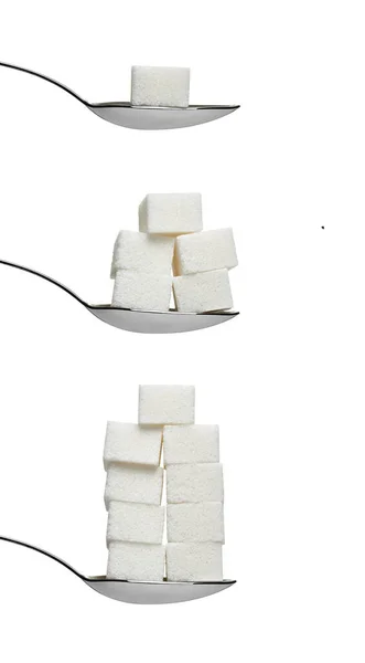 Zuckerwürfel und Löffel süßer Süßstoff — Stockfoto