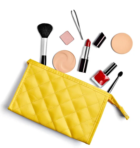 close up of a vanity case full of make up on white background