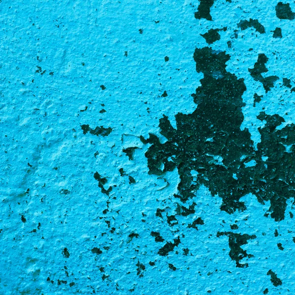 Синяя фактура старой стены с трещинами на краске — стоковое фото