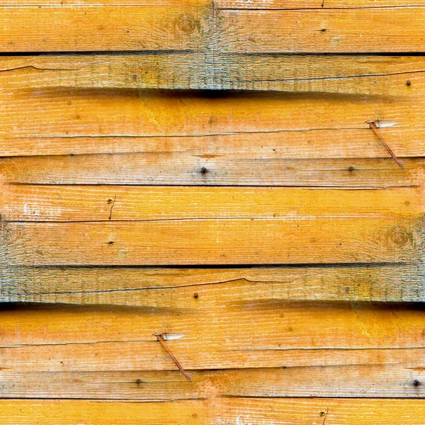 Smidig konsistens av trästaket av den gamla gula — Stockfoto