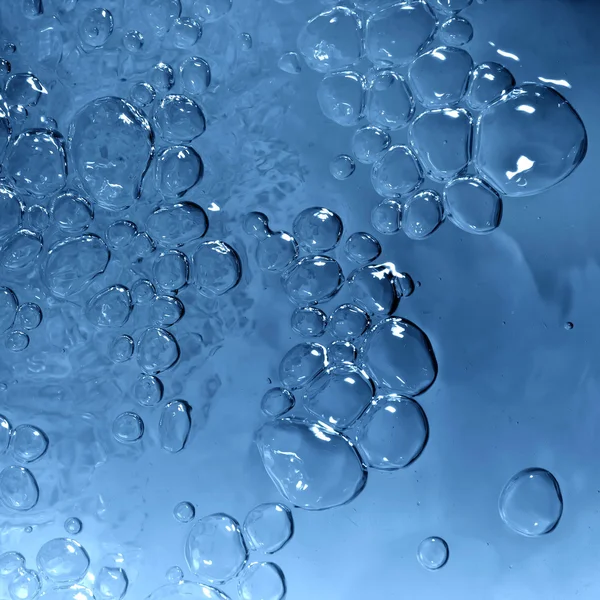 Water splash drop bubbles blue texture background — Stock Photo, Image