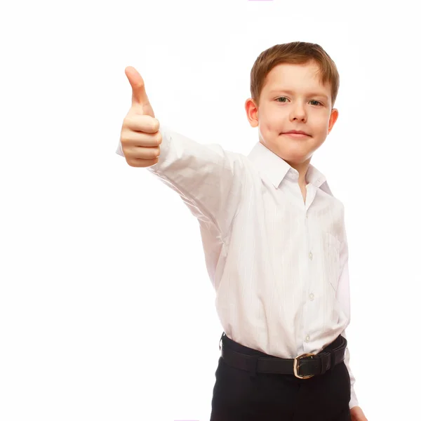 Divertente bambino biondo pollice in su fa un gesto dice OK su una ba bianca — Foto Stock