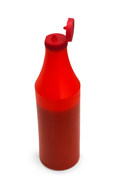 Red plastic ketchup bottle isolated on white — Stock Photo, Image