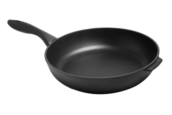Чорна сковорода для кухні на білому тлі (відсікання — стокове фото
