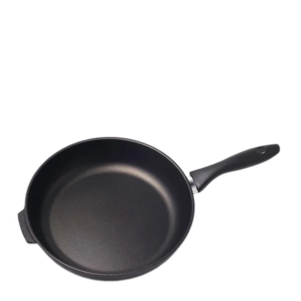 Izole beyaz zemin üzerine siyah pan mutfak — Stok fotoğraf