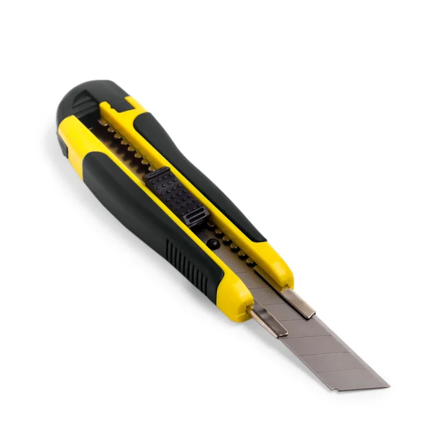 Coltello cancelleria giallo su sfondo bianco — Foto Stock